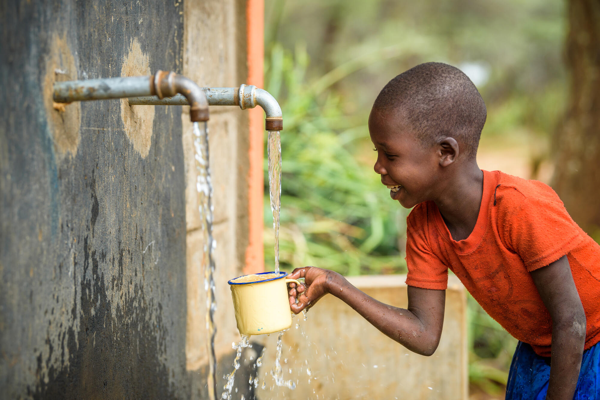 Cheru, 6, fills her cup with clean drinking water at the water kiosk near her home.

She and her whole community benefits from a 16 km gravity-fed World Vision pipeline that brings clean water to 6 kiosks in her village. Along with other children, she used to walk 6 km daily to carry water to school and home. Now the pipeline brings water to both places. 

West Pokot, KenyaSee Cheru’s story, here: https://www.worldvision.org/clean-water-news-stories/compare-walk-for-water-cheru-kamama 

Kesot community, Sook ADP, West Pokot, Kenya